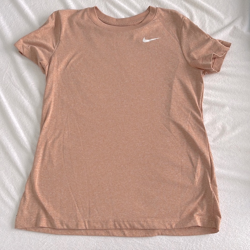 Light orange pinkish color. Nike short sleeve.